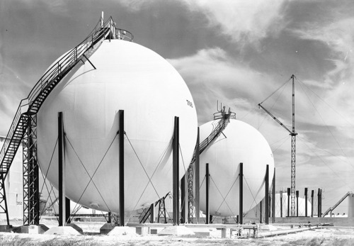 Storage tanks at the Chicago Bridge & Iron Co. petroleum plant, Lago Colony, Aruba, 1939.Photogr