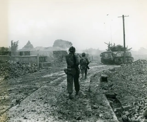 U.S. Marines From 6th Marine Division, Enter The Outskirts Of Naha, Okinawa. May 1945