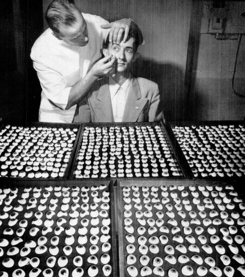 Movable eye, 1948. From trays of assorted eyes codesigner Fritz Jardon of american optical company finds a match for patient’s good right eye.