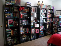 whatlovelybooks:  wovenwithwords:  my messy bookshelves featuring my Legend of Korra obsession.  …i think i just got a bookshelf boner…