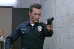 Thesunatmidnight2:Its No Accident That The Terminator Was Pictured As A Police Officer…