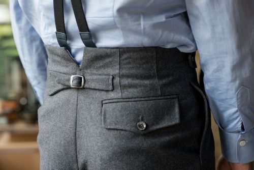 leatherfootshoes:Details on a pair of grey flannel trousers with no waistband. To see more of what&r