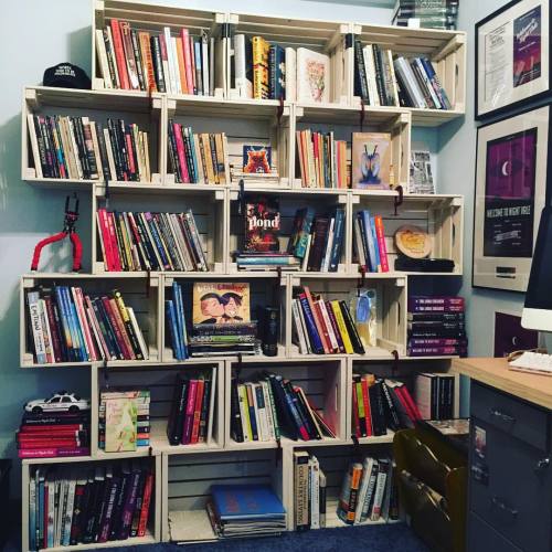 happierman:finally finished painting & assembling the bookshelf in my office. I spy…me!I 