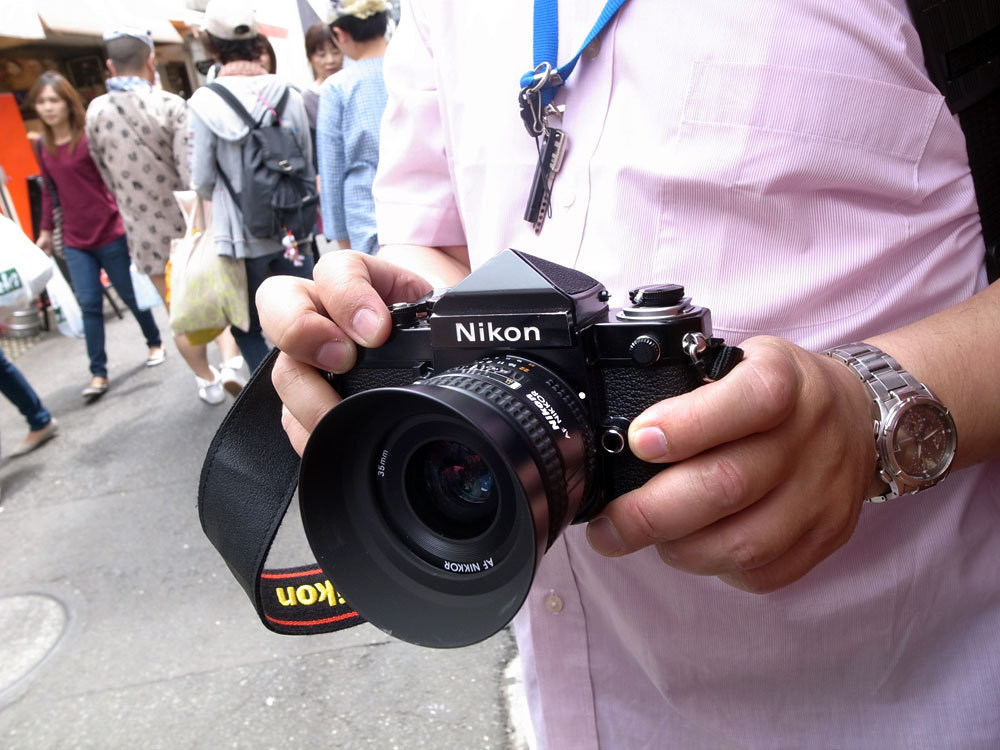 tokyo camera style — Asakusa Nikon F2 with eye-level finder and AF...