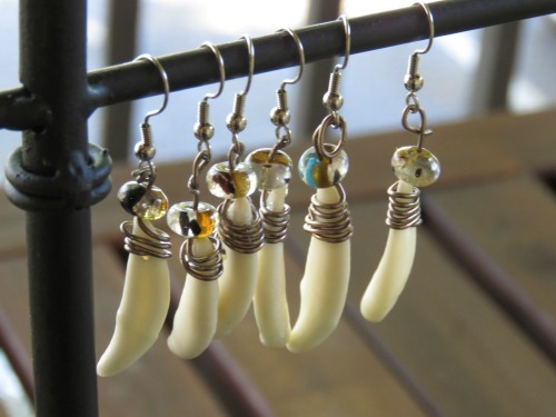 taste-of-envy:Did you know I make jewelry out of bones!?!Well now you do! Now available in my store Coyote Fang earrings along with other goodies! Everything is made by hand by me and the animal remains are treated with great respect and care <3Get