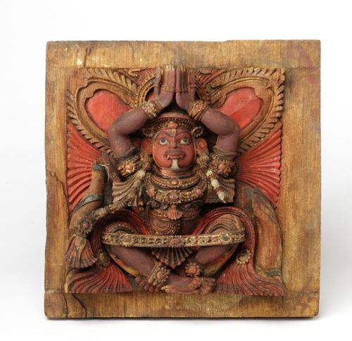 This is one of series of carved teakwood ceiling panels with reliefs of various Hindu deities. They 