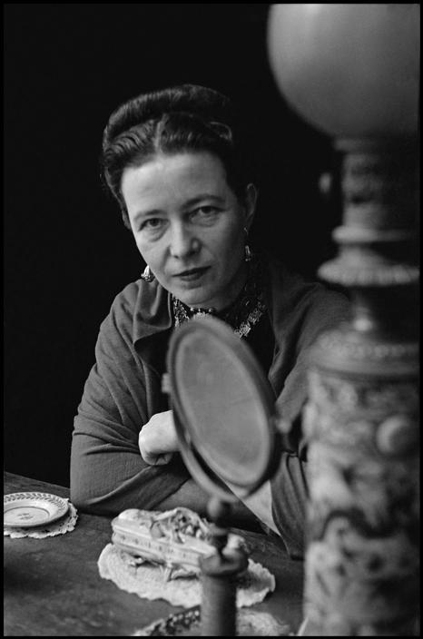 beauvoiriana:Simone de Beauvoir at her apartment. Paris, 1952. Photo: Elliott Erwitt.