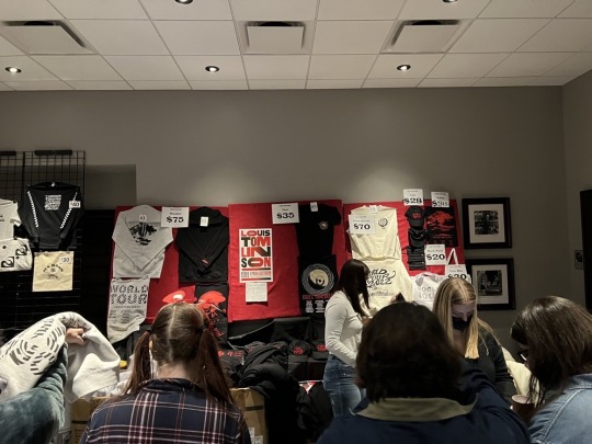 HL DAILY — A view of the merch table for tonight including a