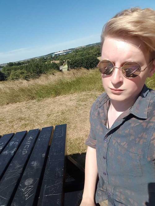 I’m off work and taking a walk in hot, windy Nottingham UK, and this bench is carved all over saying