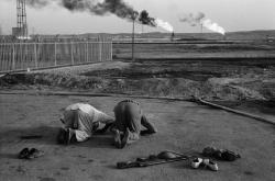 madfuture:  IRAN. Khuzestan Province. Ahwaz. 1979. Militiamen in charge of the protection of oil fields, praying. - Abbas. 