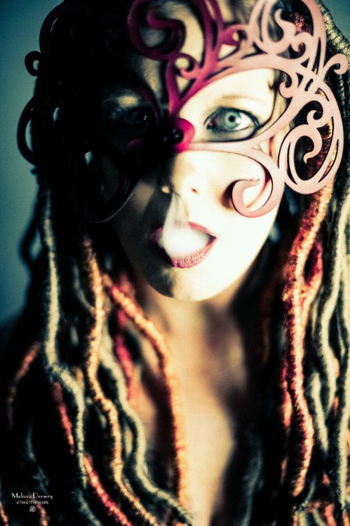ohlalanola:  More from my NOLA inspired mask series: ‘Domina T Smoking/Queen of Mardi Gras #3’. MUA/stylist Nina Lopez, leather fetish mask by Tom Banwell Designs. https://www.facebook.com/melissa.l.drewryhttps://www.facebook.com/nina.lstylist