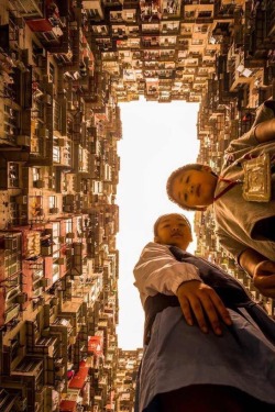 shopboyz:Two kids pose for the camera at Hong Kong’s Quarry Bay.