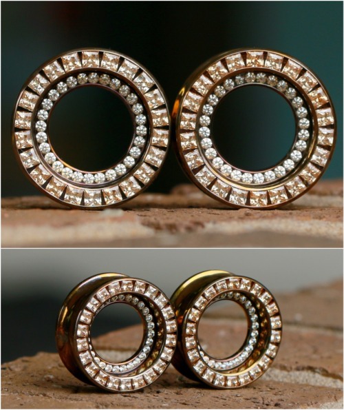 Double orbit eyelets with champagne CZs in bronze titanium by Anatometal in 1″@anatometal