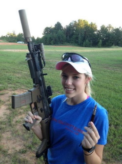 girlandguns:  Girl With Gun  http://girls-andguns.blogspot.com/