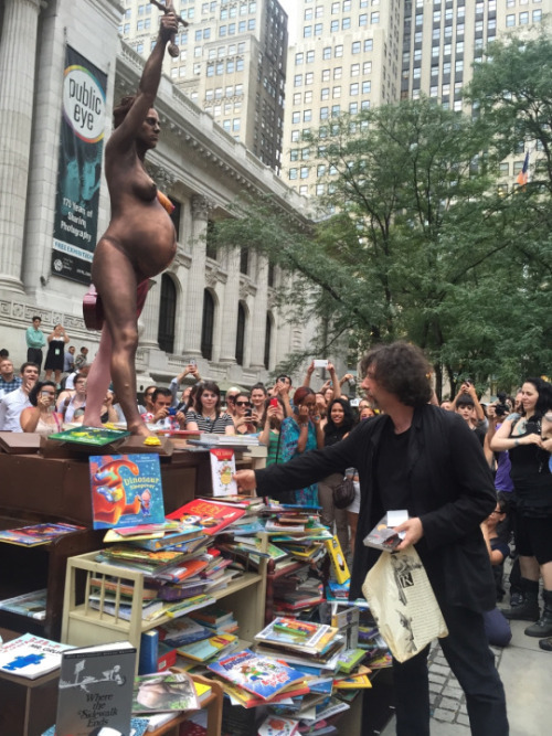 perceval23:   Amanda Palmer as a statue for a children’s book benefit at the New York Public Library.  And here’s David Hirst’s Verity, that she’s recreating. 