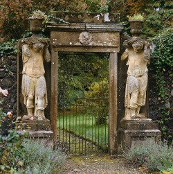 tselentis-arch:  Stone entrance, flanked by a pair of statues at Charleton House, Scotland, 18th c. [+] Photo: Fritz von der Schulenburg, via The Interior Archive   they literally have peasants supporting the urns