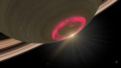 astronomyblog:    These swirls of red light are an aurora on the south pole of Saturn. Image: NASA/ESA/STScI/A. Schaller. 