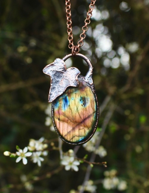 Multicoloured labradorite crystal adorned with an ivy leaf Just one of the necklaces now available h