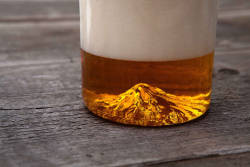 blazepress:  Awesome Pint Glasses Feature a Mountain Molded into Their Base