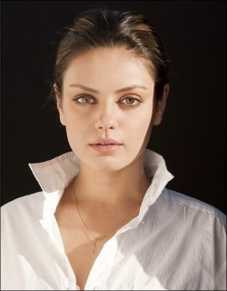 mila-kunis-is:  She is very  showy