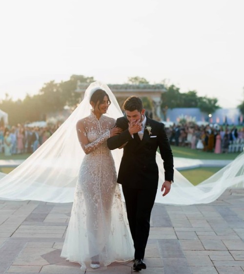 Who is obsessed with this?. @priyankachopra wore a beautiful dress by @ralphlauren for her wedding w