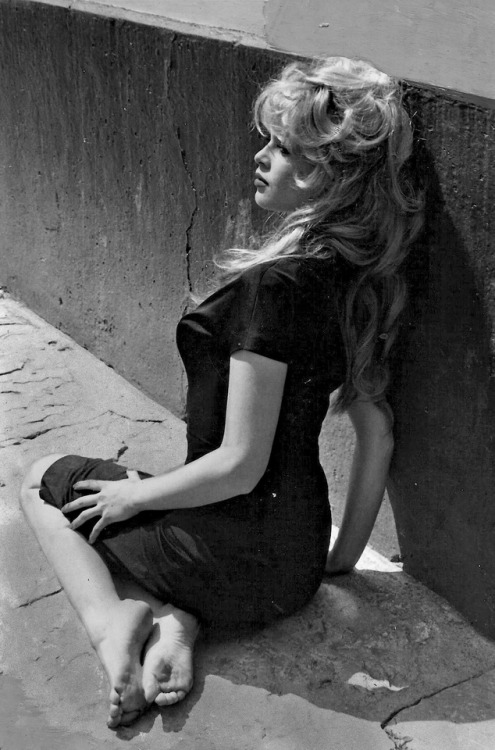 Brigitte Bardot in 1958, taking a break from filming The Female. Photos by Roger Corbeau.