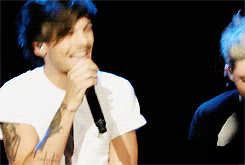 lewisandneil:  Louis sings off key and then stops, embarrassed - x 