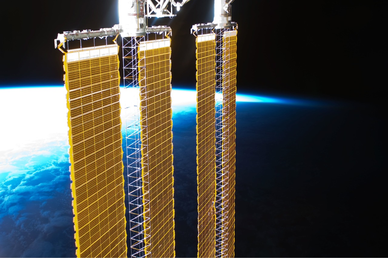 humanoidhistory:  A view of International Space Station solar panels and Earth’s