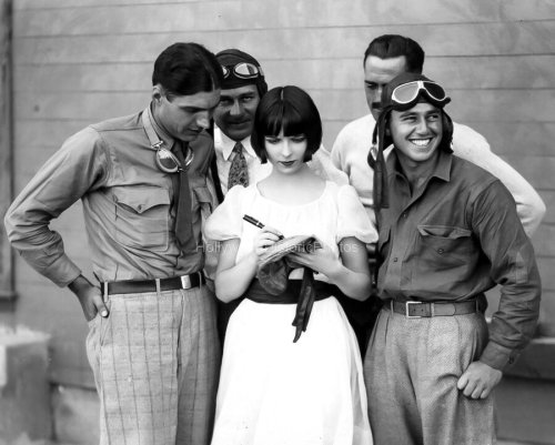 clarabowlover:Louise Brooks - Signing Autographs For Stuntmen And Crew MembersFor Now We Are In The 