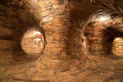 jedavu:Artist Henrique Oliveira Constructs a Cavernous Network of Repurposed Wood Tunnels at MAC USP