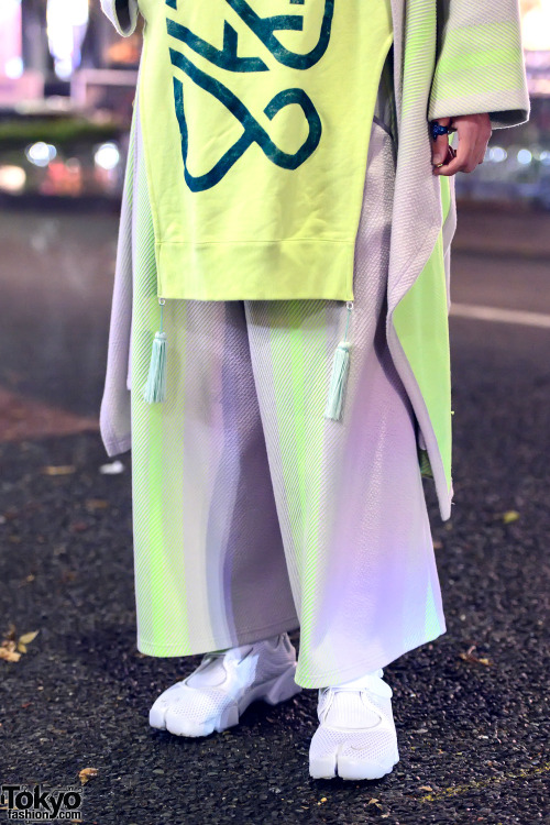 tokyo-fashion:20-year-old student Ren on the street in Harajuku wearing a matching neon hoodie, coat