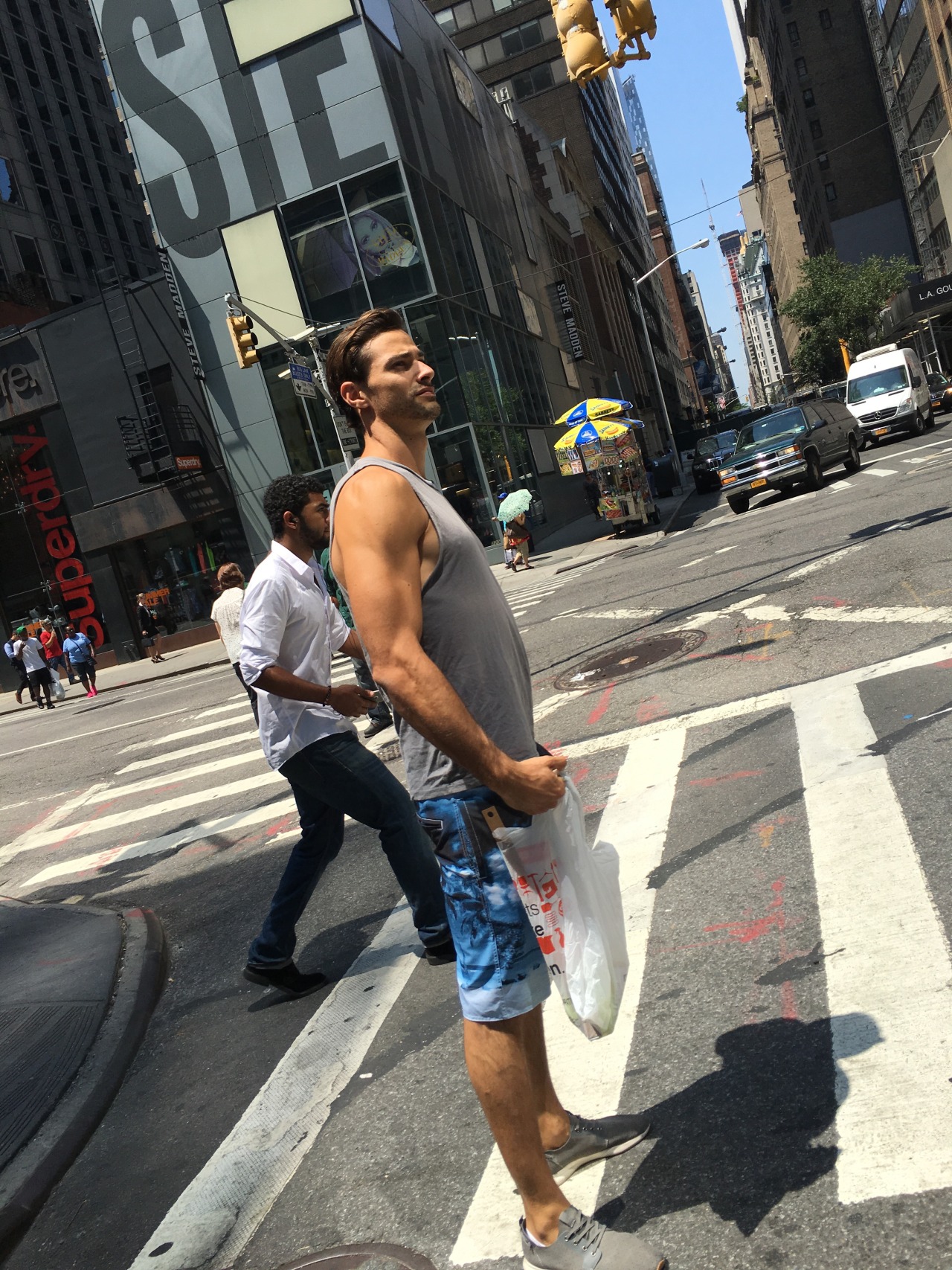 nychotguys:  Tank Top Hottie on Lexington Ave. NYC.Thanks EverydayHotness!