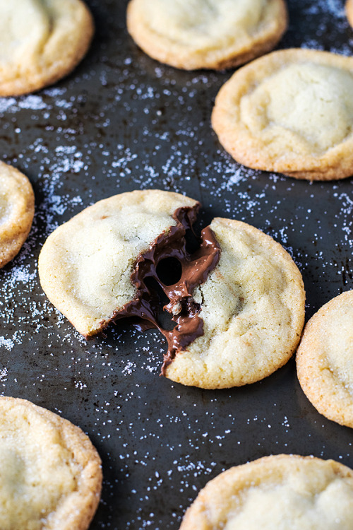 foodffs:  Nutella Stuffed Sugar Cookies! Old fashioned soft and chewy sugar cookies stuffed with creamy Nutella. It’s as delicious as it sounds! GET THE RECIPE: http://homemadehooplah.com/recipes/nutella-stuffed-sugar-cookies/