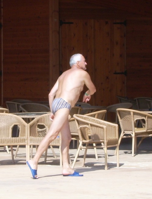 stockymaturemales:Nice grandpa playing darts with himself.