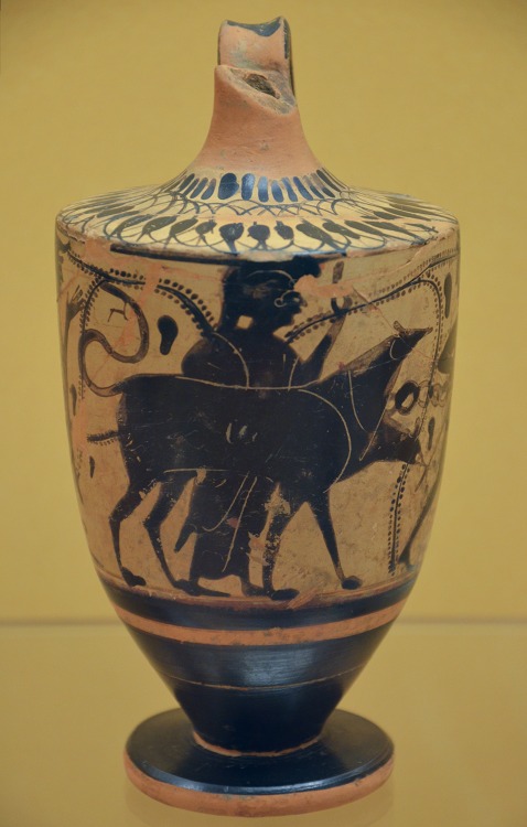 Heracles and Cerberus.  Attic black-figure lekythos, artist unknown; ca. 500-470 BCE.  Now in the Na