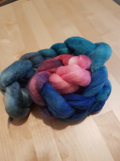 Cotton Candy Summer roving. Two ropes of Merino/Silk blend (second and third pictures) and one rope 