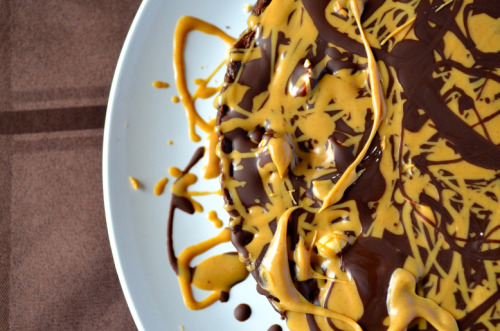 sweetoothgirl:   Chocolate Peanut Butter Truffle Pie with Brownie Crust   