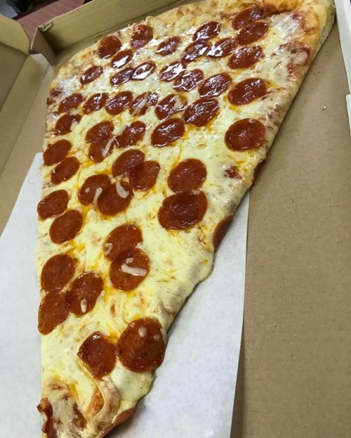 ffambrosia-blogs: imaf00die777:  ONE GIANT SLICE . 👅🍖🍕  Happy National Pepperoni Pizza Day, everyone! 