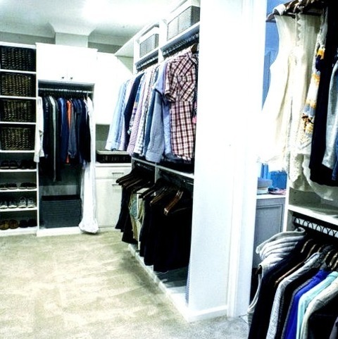 Charlotte Raised-PanelExample Of A Large Classic Carpeted And Gray Floor Walk-in Closet Design With Raised-panel
