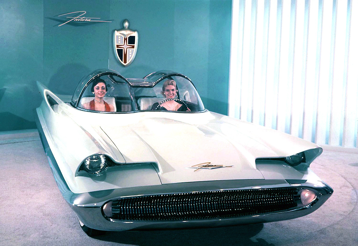 20th-century-man:  Models with the Lincoln Futura concept car, 1955. The Futura would