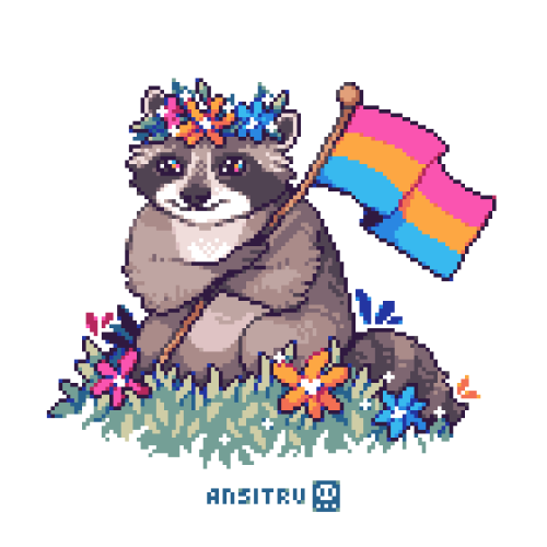 A raccoon in a flower crown, sitting in a grass field with a pink, yellow and blue flower, holding a pan pride flag.