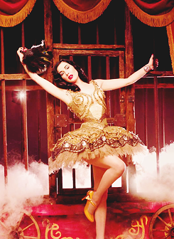 :  Dita Von Teese in a circus-themed photoshoot for Plastic Dreams magazine. 