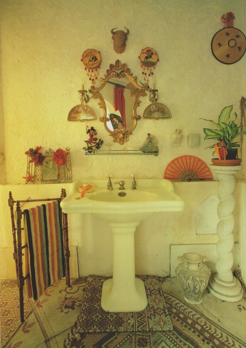 vintagehomecollection: Tambourines and fans are hung around the antique washbasin. The International