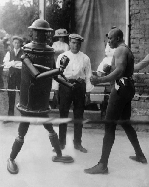 pizzzatime:
“elisemesner: Jack Johnson battles the Victorian-era robot “Boilerplate,” ca 1910’s
”