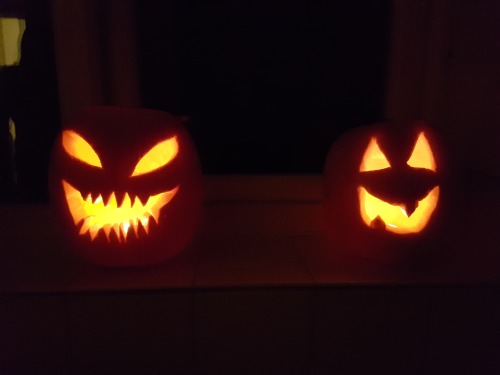 Mine (left) and @it-is-michelle ’s (right) attempt at carving pumpkins, as she’d never d