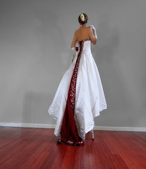 onlymonica: Going to great heights here to show how long the train on this Alfred Angelo wedding dre