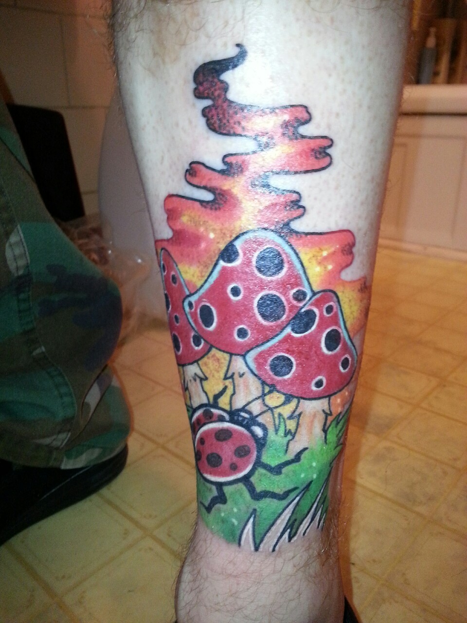 My new tattoo I got tonight..  always wanted some mushrooms and the ladybug is for