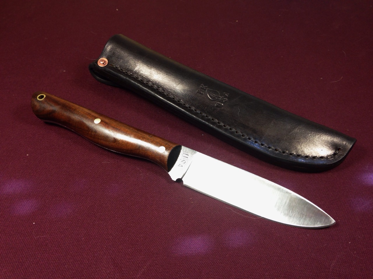 manversuslife:  Bushcraft knife from a file.  Walnut scalesWww.tindallknives.com