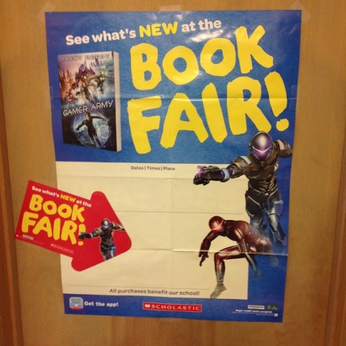 I haven’t hung up a poster since college, but the good people at Scholastic Book Fairs were ki
