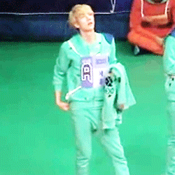 jnumyeon-deactivated20140929:  sehun holding and smelling zitao’s hoodie ヽ(*≧ω≦)ﾉ